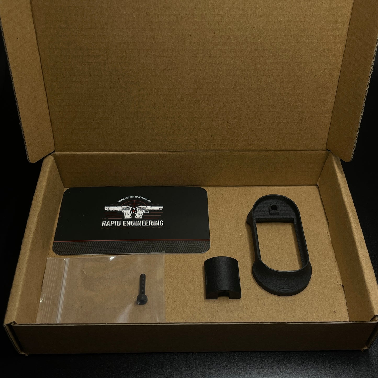 Rapid Engineering Inc. magwell for Glock 43X & 48, view of packaged part with all included components.