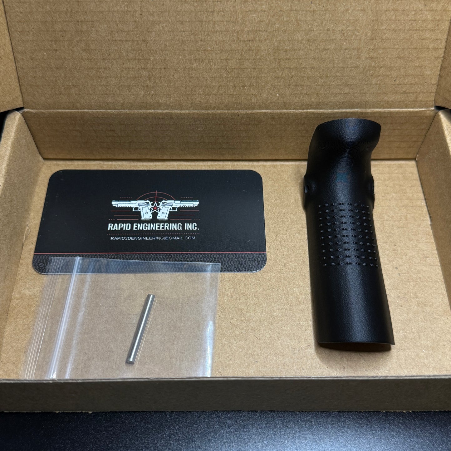 Rapid Engineering Inc. large backstrap beavertail grip for Glock 43X & 48, detailed view showing part in packaging.