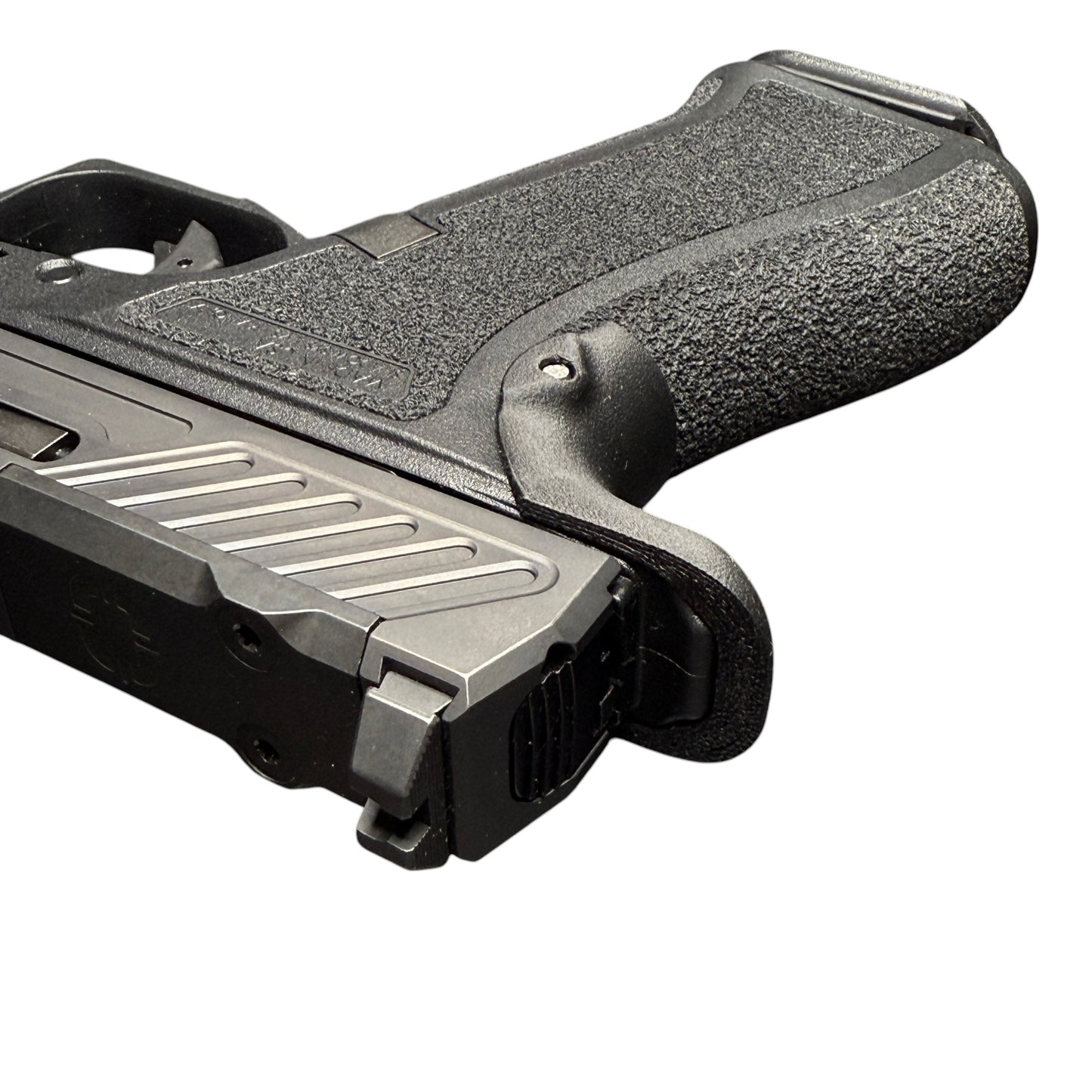 Rapid Engineering Inc. chopped backstrap beavertail grip for Shadow Systems CR920X, top view showing beavertail that eliminates slide bite.