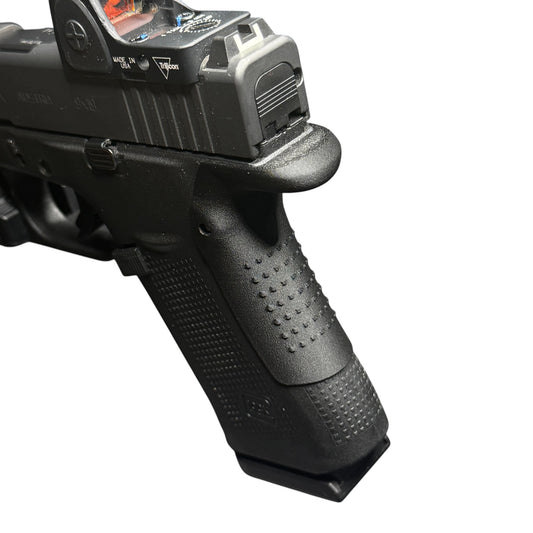 Rapid Engineering Inc. small backstrap beavertail grip for Glock 43X & 48, top angle view showing beavertail that eliminates slide bite and rounded edge.