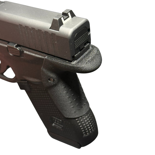 Rapid Engineering Inc. backstrap beavertail grip for Glock 42 angled view showing rounded beavertail edge