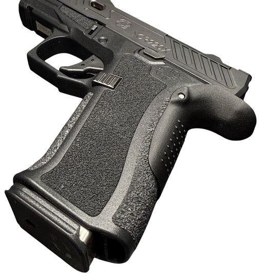 Rapid Engineering Inc. small backstrap beavertail grip for Shadow Systems CR920X, angled view showing improved grip angle for enhanced control.
