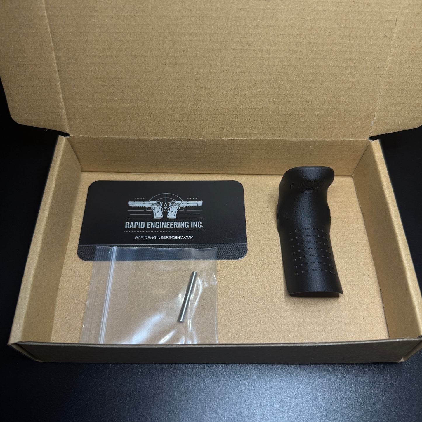 Rapid Engineering Inc. small backstrap beavertail grip for Glock 43X & 48, detailed view showing part in packaging.