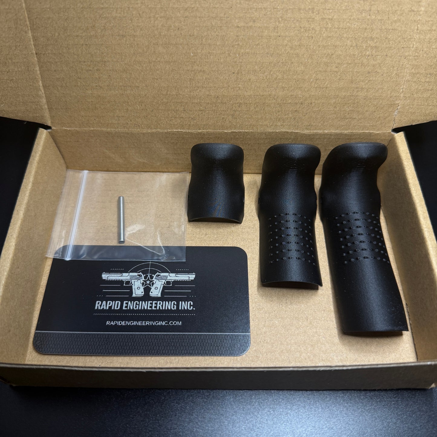 Rapid Engineering Inc. small, large & chopped backstrap beavertail grip for Glock 43X & 48, detailed view showing parts in packaging.