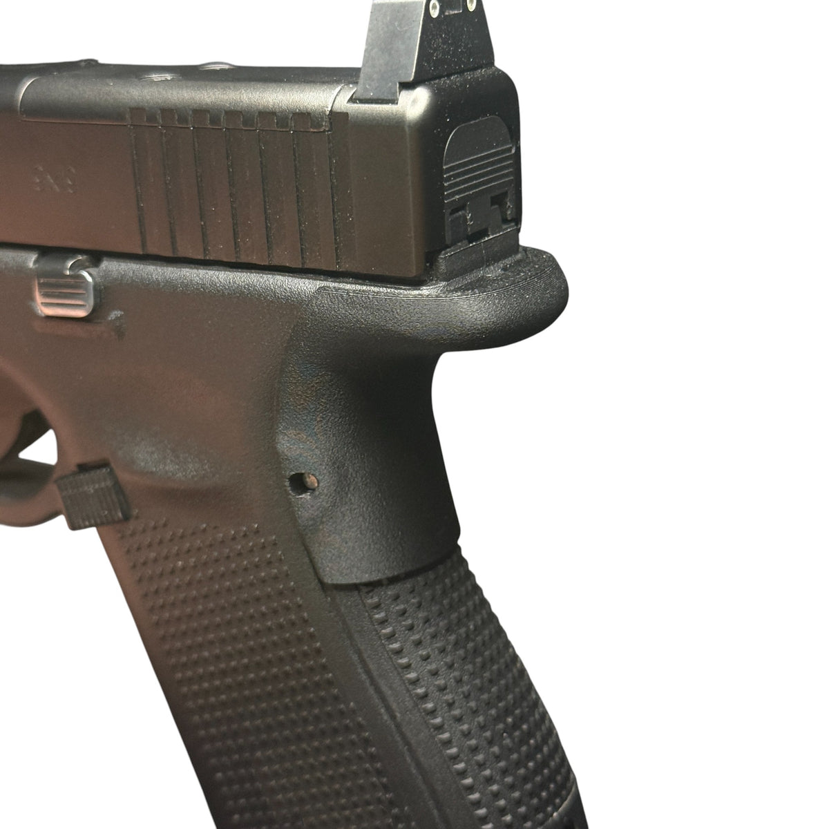 Rapid Engineering Inc. chopped backstrap beavertail for Glock 19, 23, 44, & 49 Gen 4 & 5, showing improved grip angle and beavertail close up