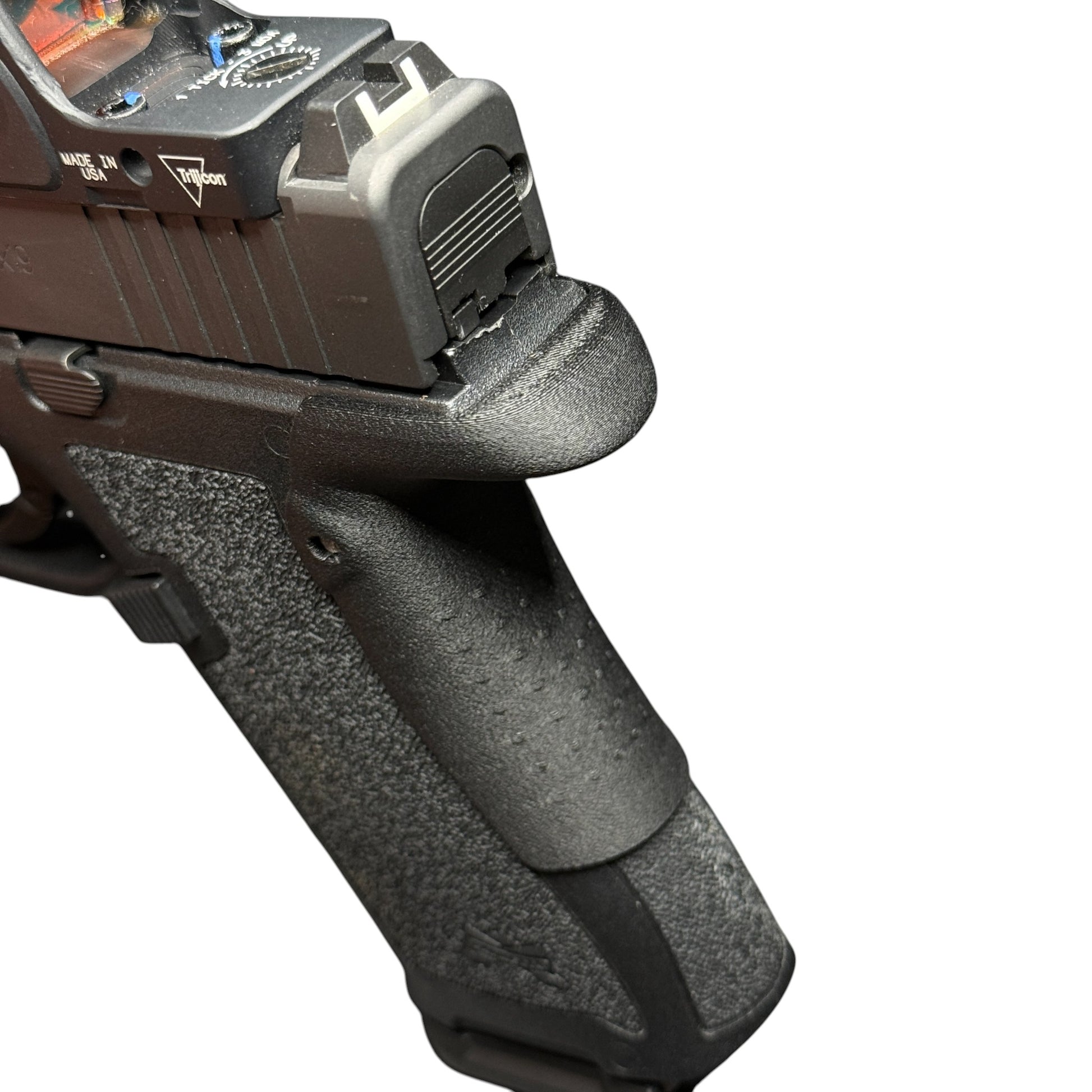 Rapid Engineering Inc. medium backstrap beavertail grip for Palmetto State Armory PSA Micro Dagger, angled view showing rounded edge of beavertail