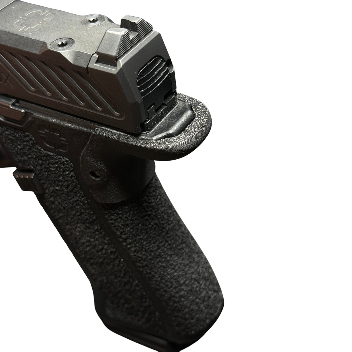 Rapid Engineering Inc. small backstrap beavertail grip for Shadow Systems CR920X, close up angled view showing rounded beavertail